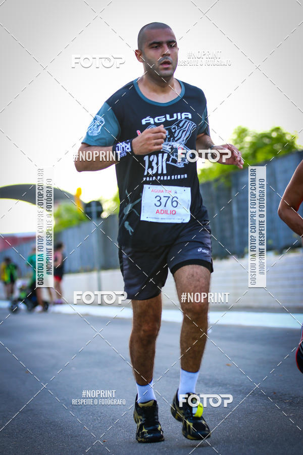 Buy your photos of the eventguia 13K Praia Grande on Fotop
