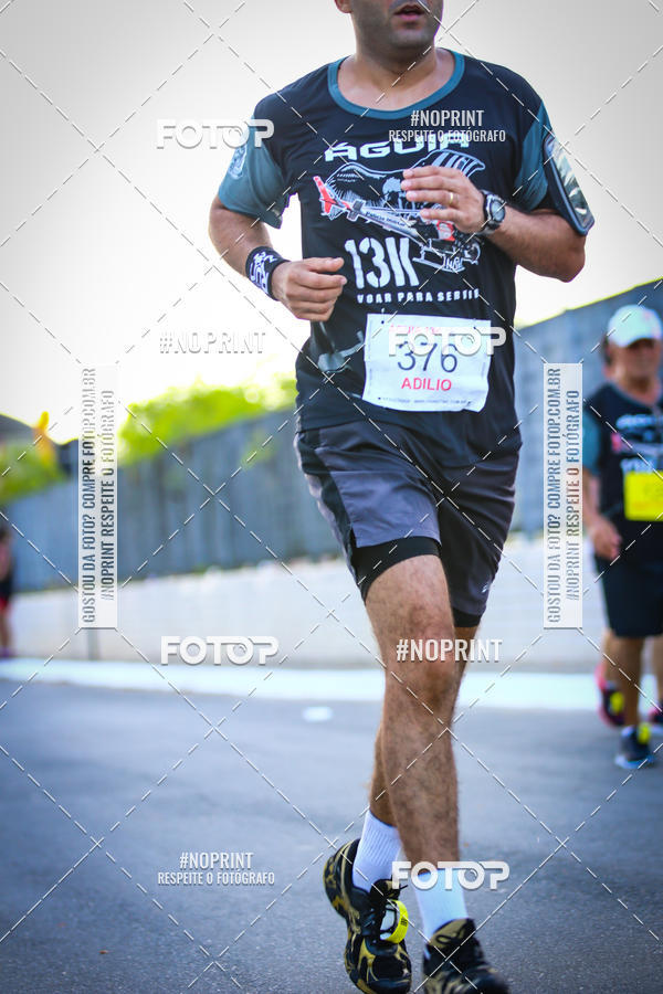 Buy your photos of the eventguia 13K Praia Grande on Fotop