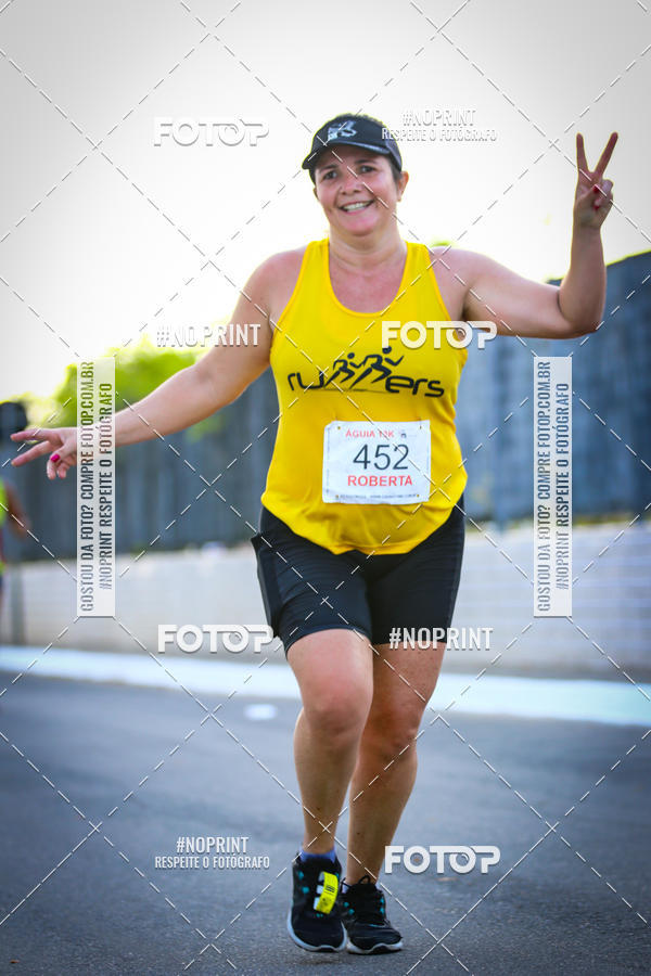 Buy your photos of the eventguia 13K Praia Grande on Fotop