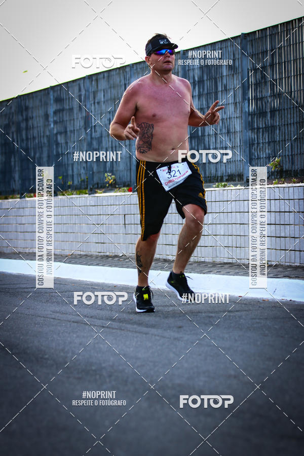 Buy your photos of the eventguia 13K Praia Grande on Fotop