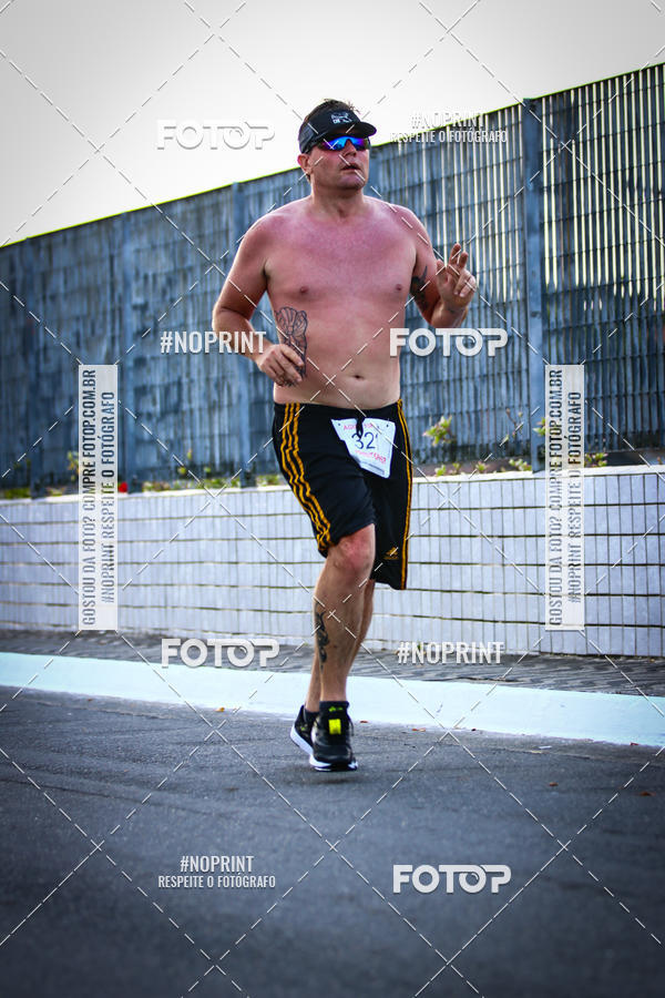 Buy your photos of the eventguia 13K Praia Grande on Fotop