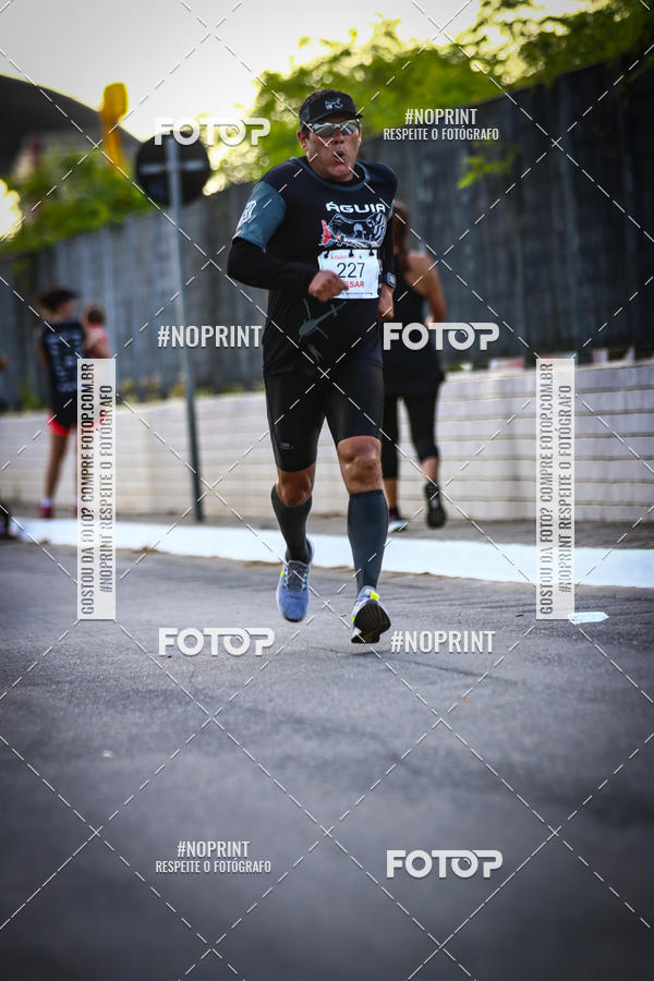 Buy your photos of the eventguia 13K Praia Grande on Fotop