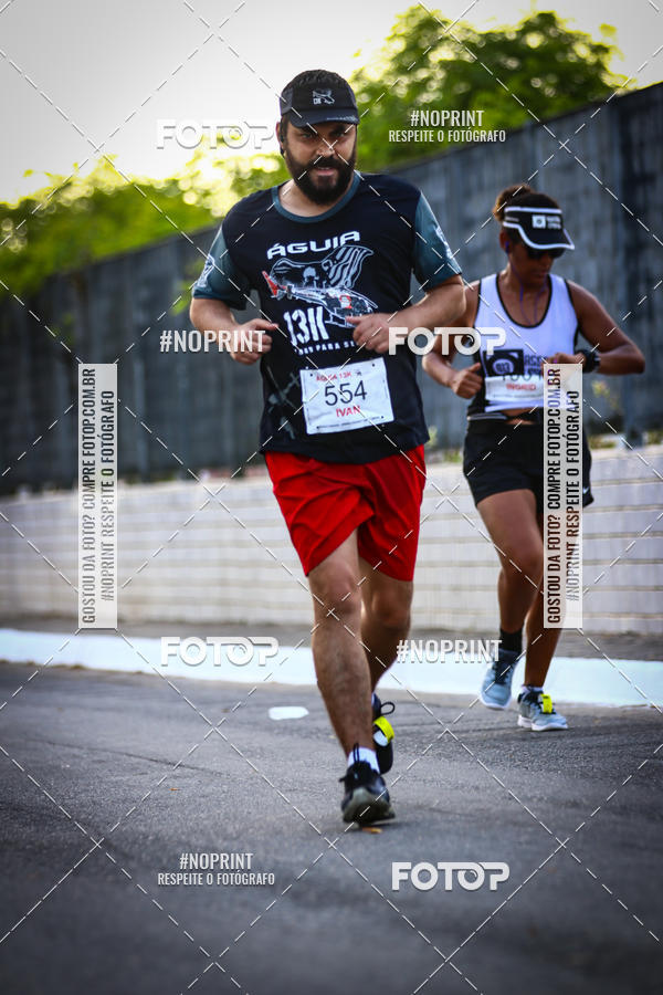 Buy your photos of the eventguia 13K Praia Grande on Fotop