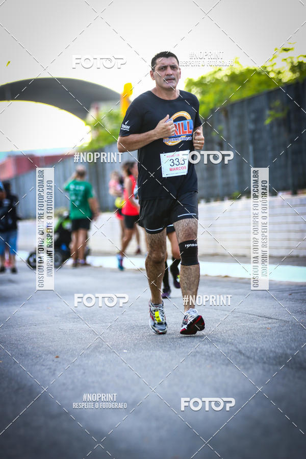 Buy your photos of the eventguia 13K Praia Grande on Fotop