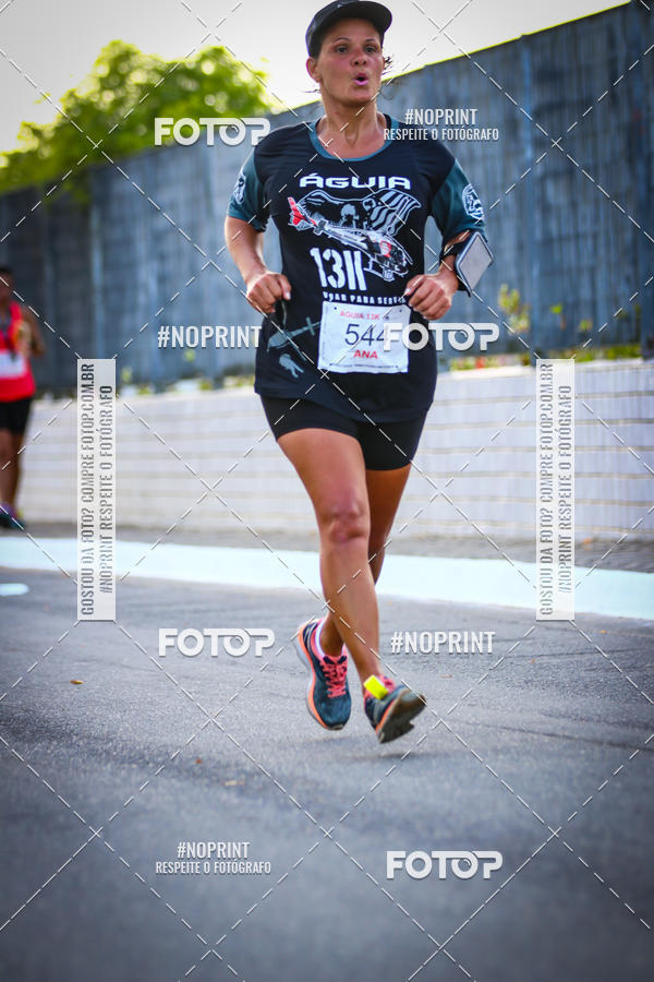 Buy your photos of the eventguia 13K Praia Grande on Fotop