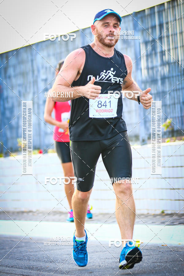 Buy your photos of the eventguia 13K Praia Grande on Fotop