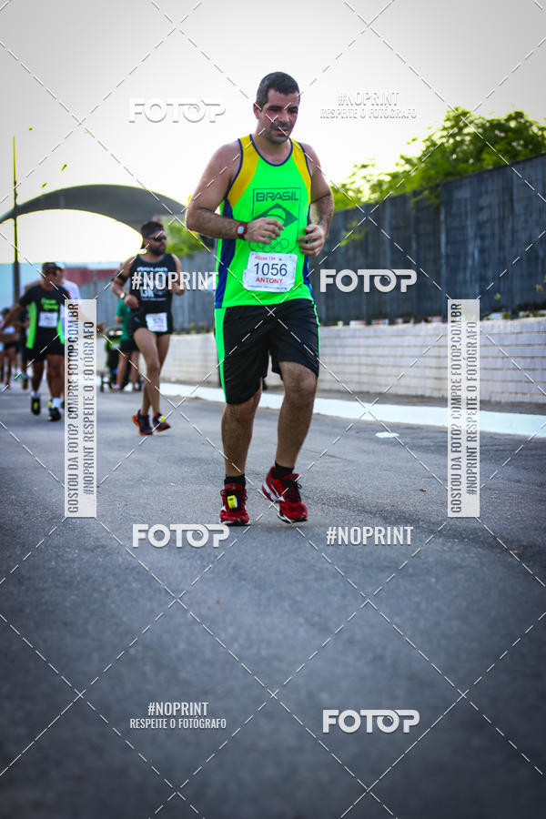 Buy your photos of the eventguia 13K Praia Grande on Fotop