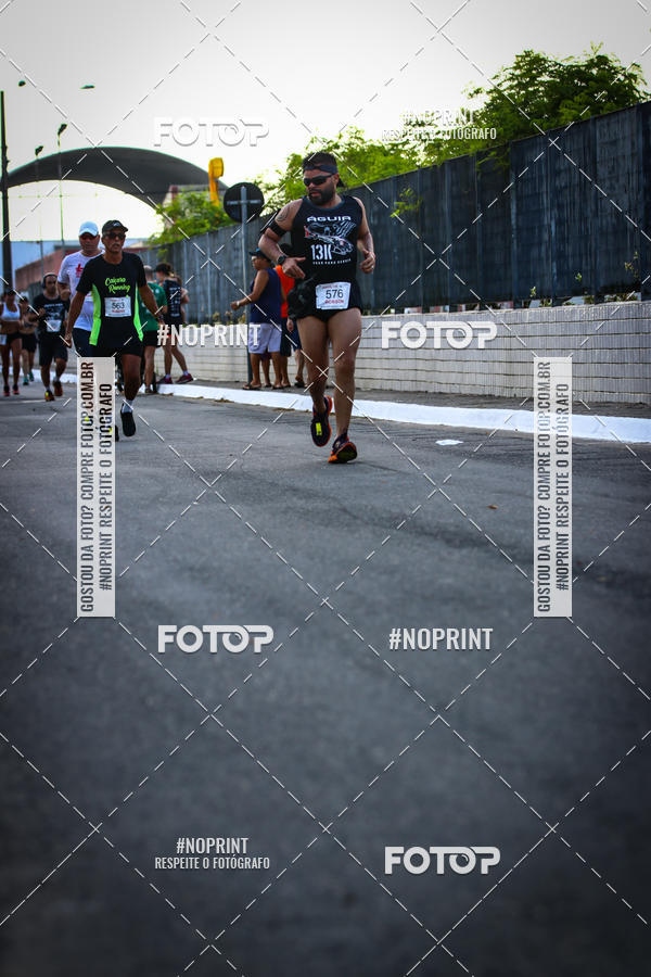 Buy your photos of the eventguia 13K Praia Grande on Fotop