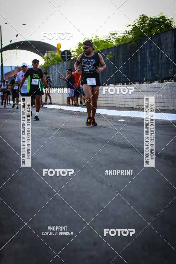 Buy your photos of the eventguia 13K Praia Grande on Fotop