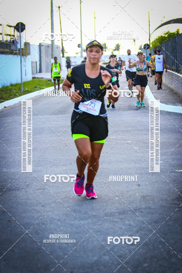 Buy your photos of the eventguia 13K Praia Grande on Fotop