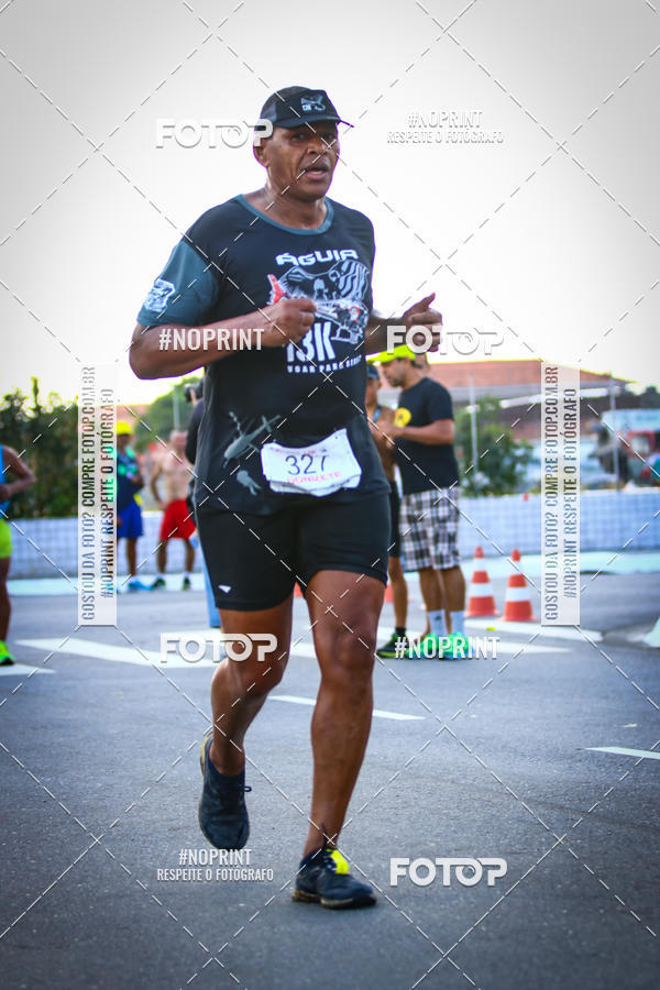 Buy your photos of the eventguia 13K Praia Grande on Fotop