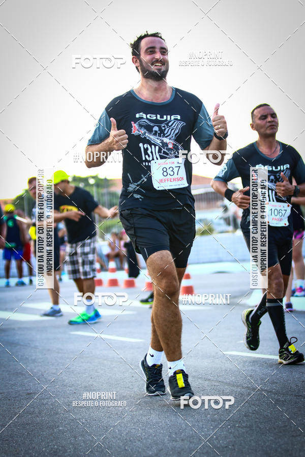 Buy your photos of the eventguia 13K Praia Grande on Fotop