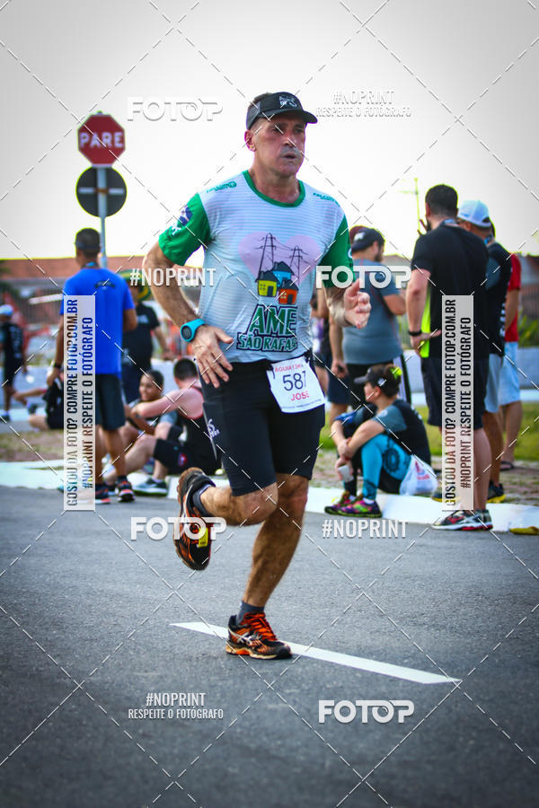 Buy your photos of the eventguia 13K Praia Grande on Fotop