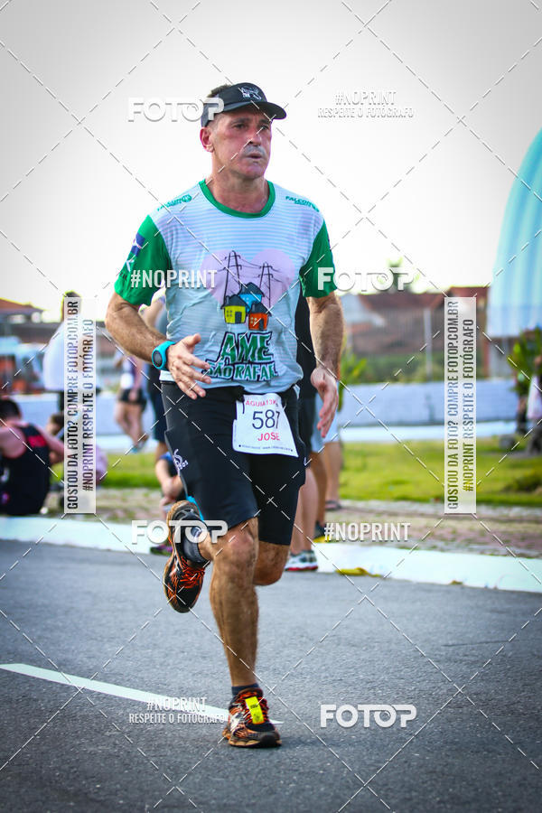 Buy your photos of the eventguia 13K Praia Grande on Fotop