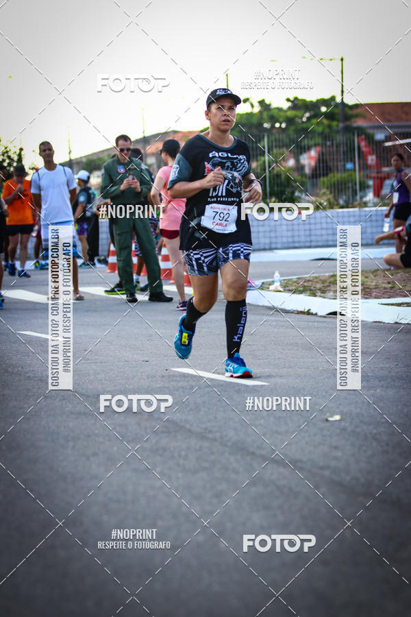 Buy your photos of the eventguia 13K Praia Grande on Fotop