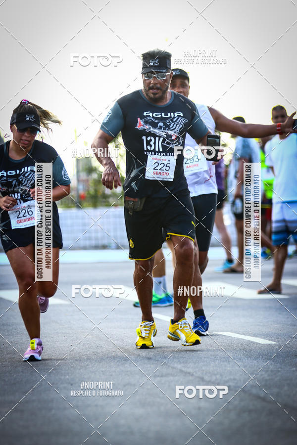 Buy your photos of the eventguia 13K Praia Grande on Fotop