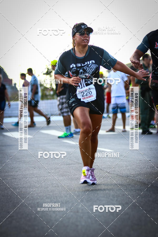Buy your photos of the eventguia 13K Praia Grande on Fotop