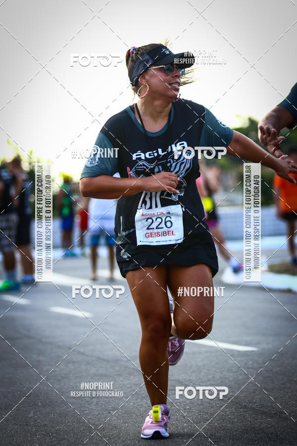Buy your photos of the eventguia 13K Praia Grande on Fotop