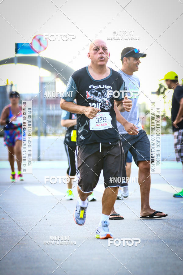 Buy your photos of the eventguia 13K Praia Grande on Fotop