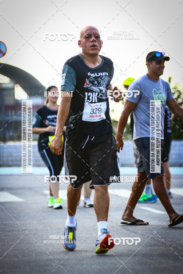Buy your photos of the eventguia 13K Praia Grande on Fotop