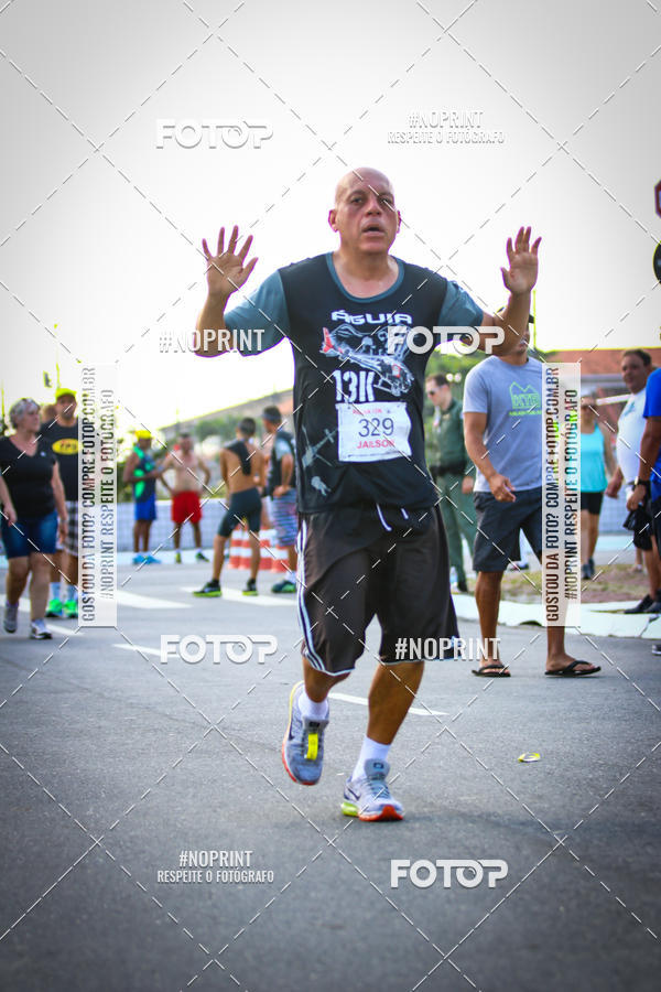 Buy your photos of the eventguia 13K Praia Grande on Fotop