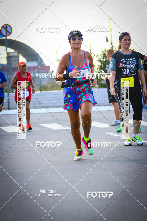 Buy your photos of the eventguia 13K Praia Grande on Fotop