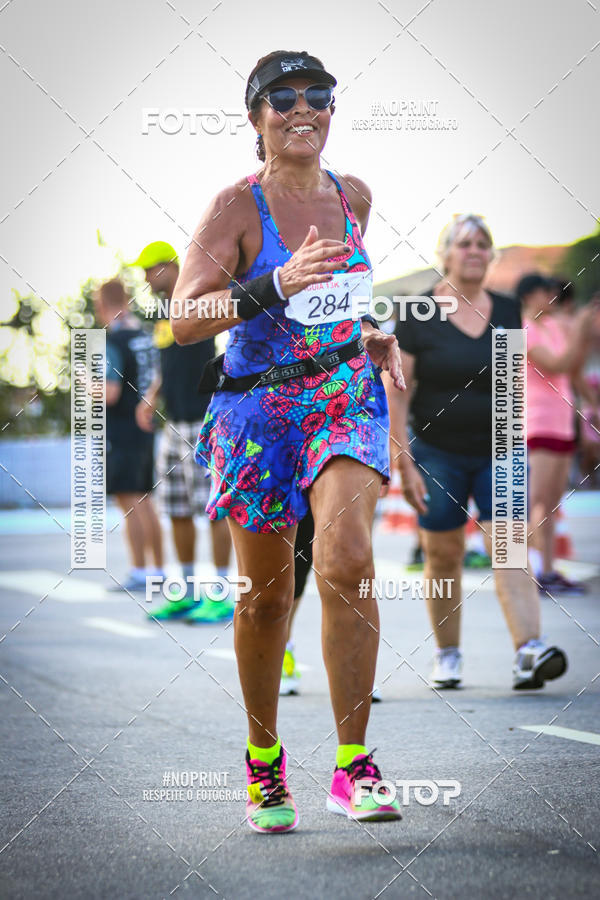 Buy your photos of the eventguia 13K Praia Grande on Fotop