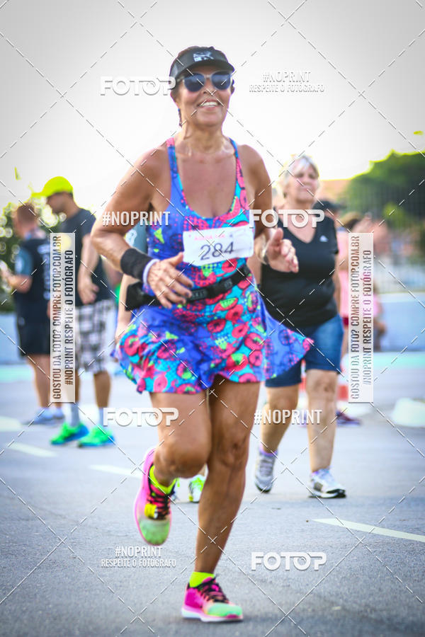 Buy your photos of the eventguia 13K Praia Grande on Fotop