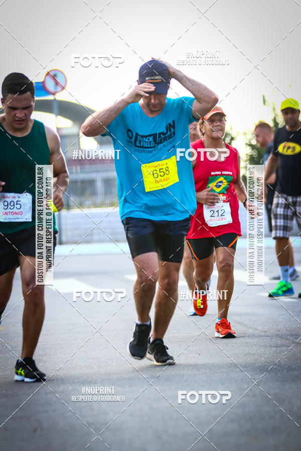 Buy your photos of the eventguia 13K Praia Grande on Fotop