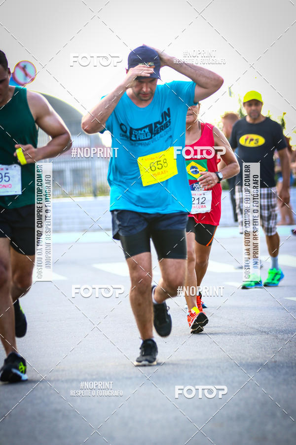 Buy your photos of the eventguia 13K Praia Grande on Fotop
