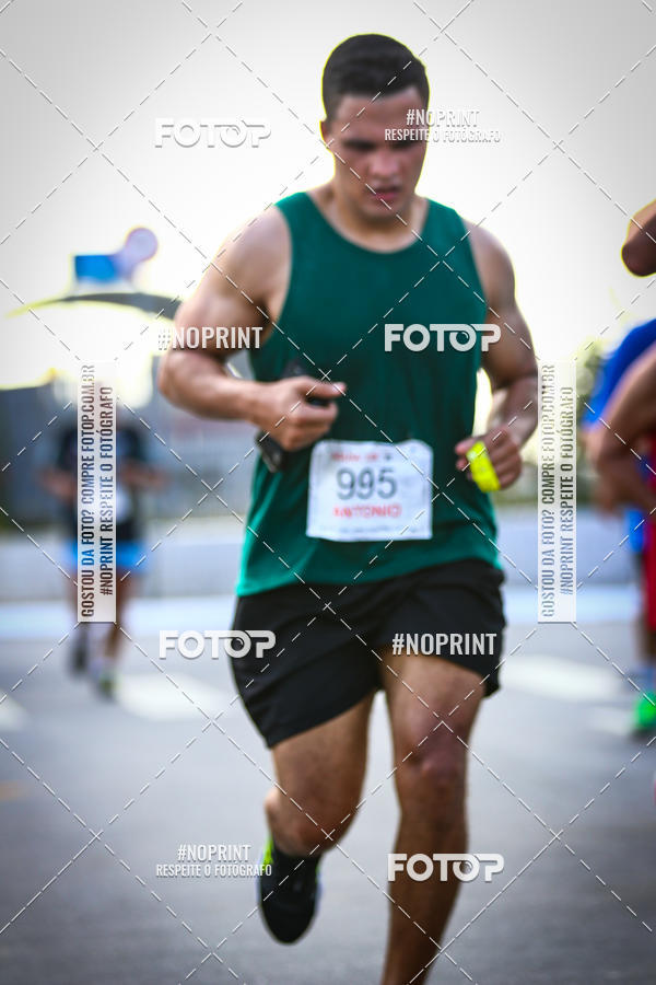 Buy your photos of the eventguia 13K Praia Grande on Fotop