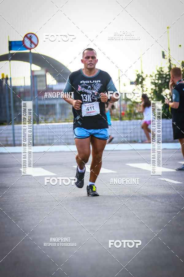 Buy your photos of the eventguia 13K Praia Grande on Fotop