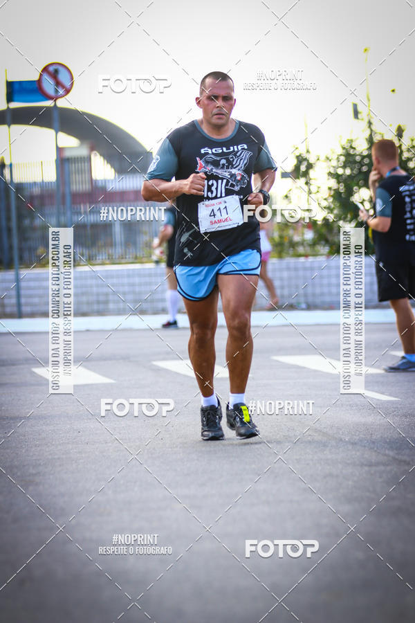 Buy your photos of the eventguia 13K Praia Grande on Fotop