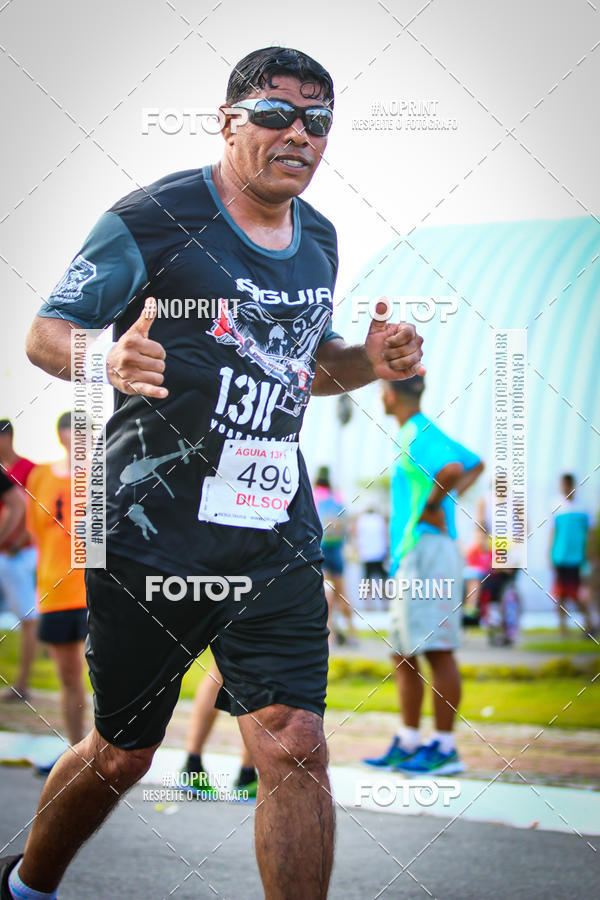 Buy your photos of the eventguia 13K Praia Grande on Fotop