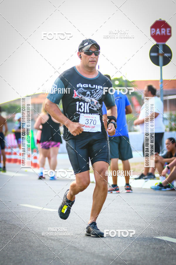 Buy your photos of the eventguia 13K Praia Grande on Fotop