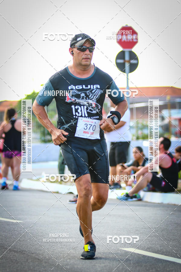 Buy your photos of the eventguia 13K Praia Grande on Fotop