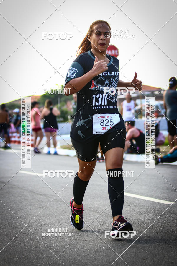 Buy your photos of the eventguia 13K Praia Grande on Fotop