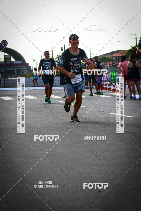 Buy your photos of the eventguia 13K Praia Grande on Fotop