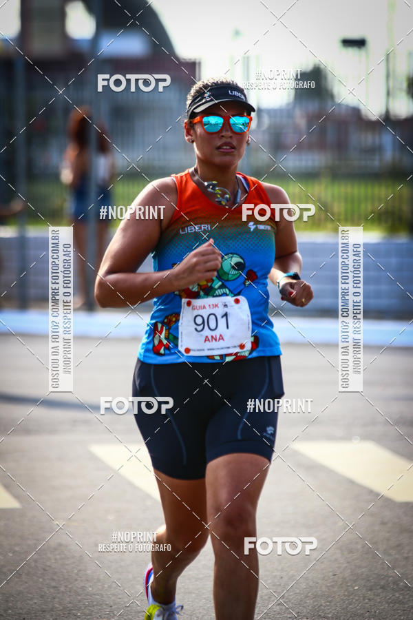 Buy your photos of the eventguia 13K Praia Grande on Fotop