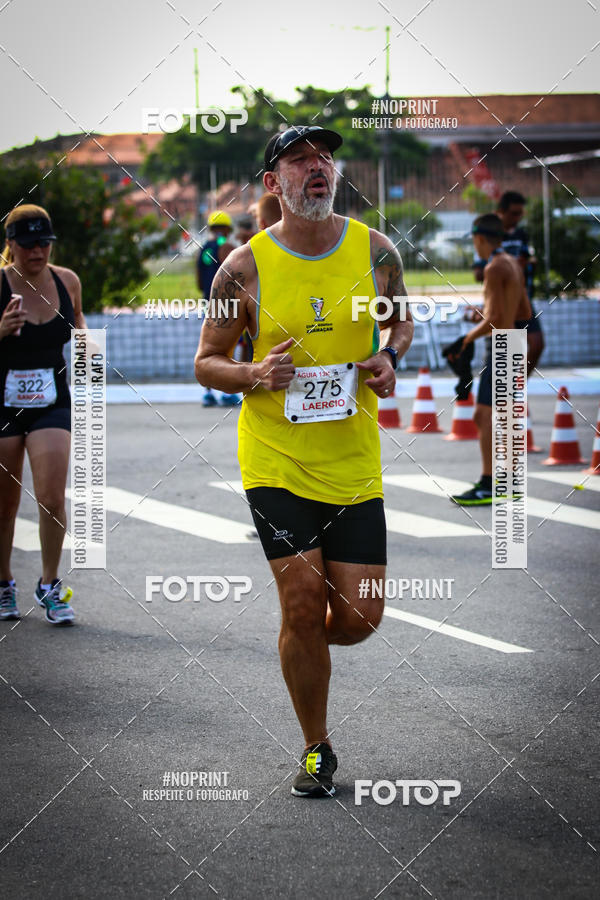 Buy your photos of the eventguia 13K Praia Grande on Fotop