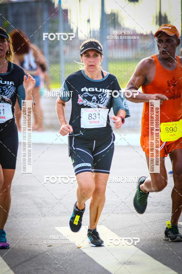 Buy your photos of the eventguia 13K Praia Grande on Fotop