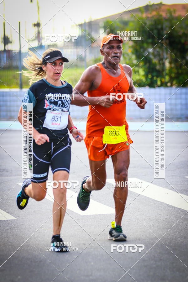 Buy your photos of the eventguia 13K Praia Grande on Fotop