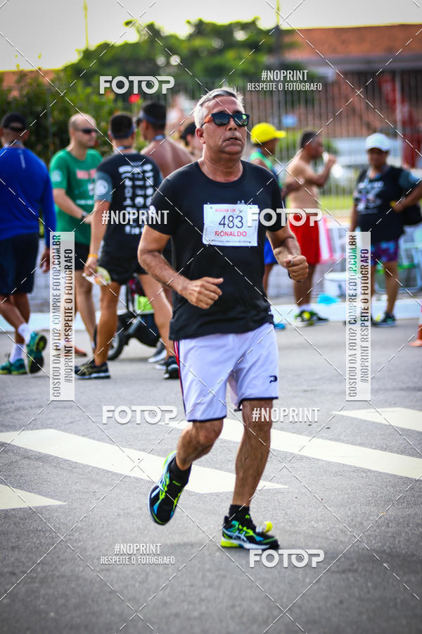 Buy your photos of the eventguia 13K Praia Grande on Fotop