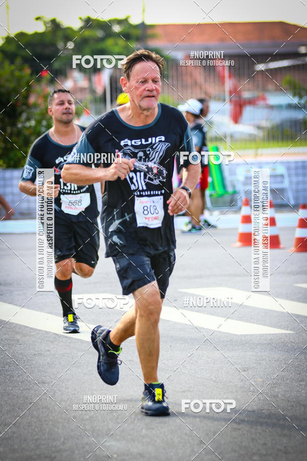 Buy your photos of the eventguia 13K Praia Grande on Fotop