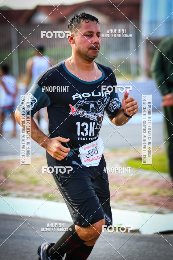 Buy your photos of the eventguia 13K Praia Grande on Fotop