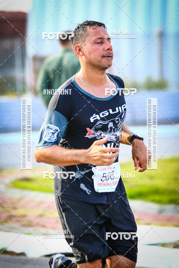 Buy your photos of the eventguia 13K Praia Grande on Fotop