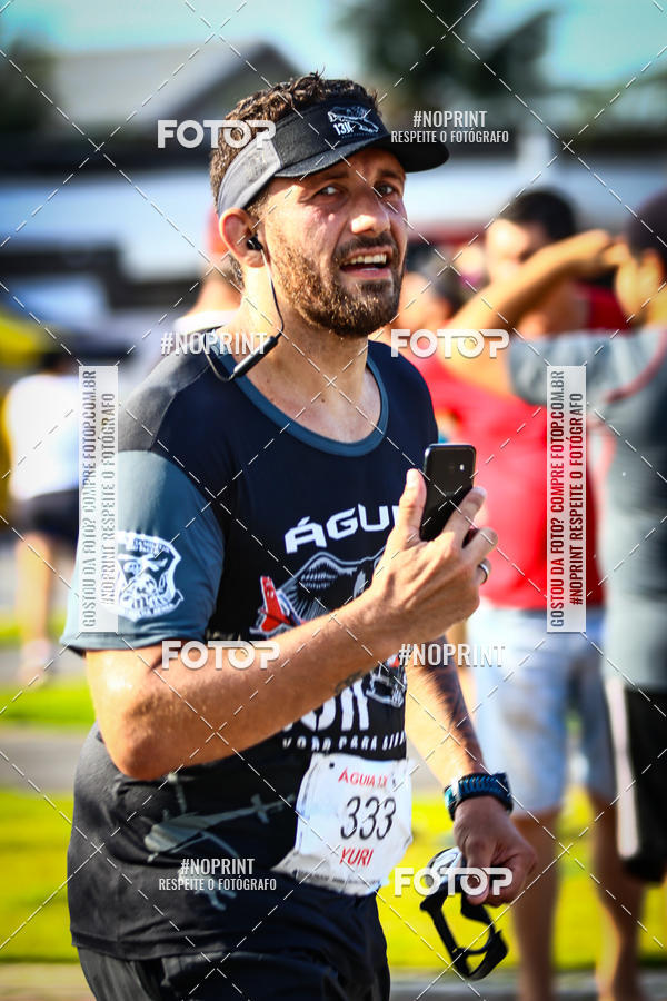 Buy your photos of the eventguia 13K Praia Grande on Fotop