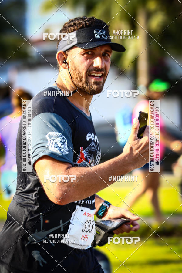 Buy your photos of the eventguia 13K Praia Grande on Fotop