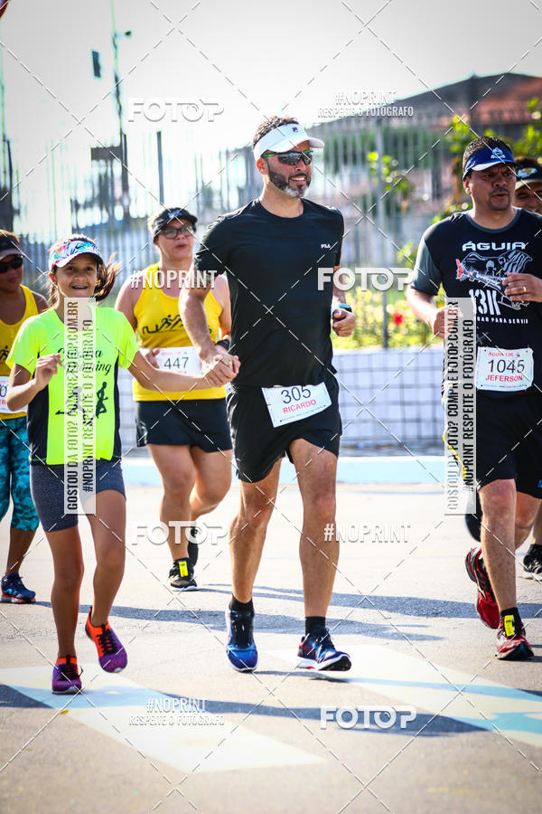 Buy your photos of the eventguia 13K Praia Grande on Fotop