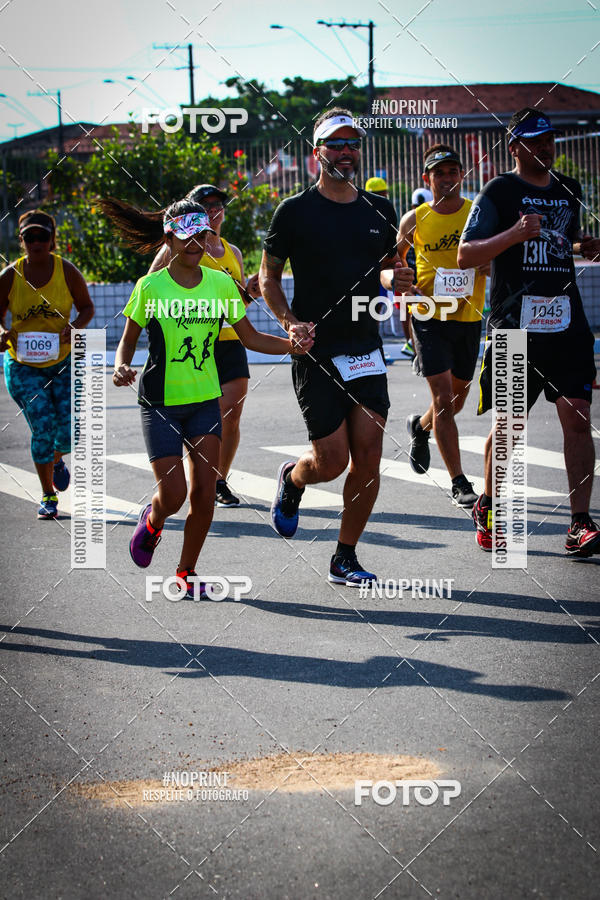Buy your photos of the eventguia 13K Praia Grande on Fotop